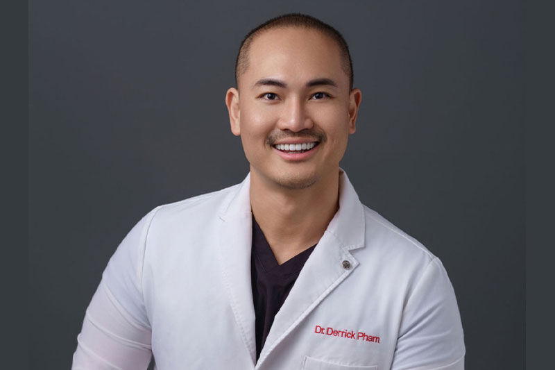 Dr. Pham with a patient